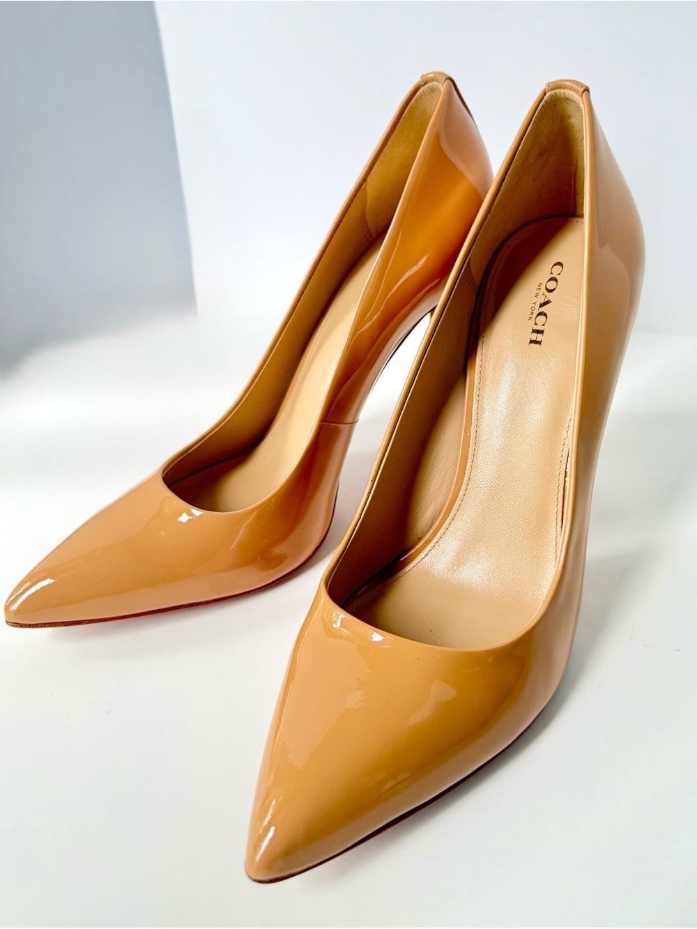 Coach Patent Leather Pointed-Toe Pumps in Camel Tan